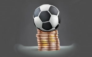 ballon football sur une pile d'argent généré par craiyon